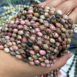 6*8mm black-lines Rhodochrosite faceted rice beads